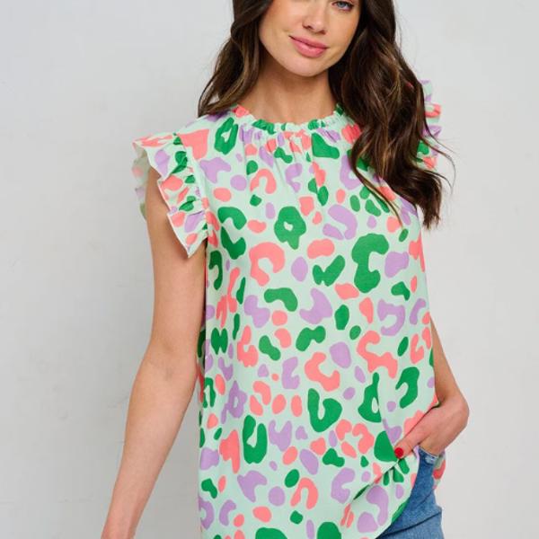 Ruffle sleeve tunic blouse with vibrant multi-print design.