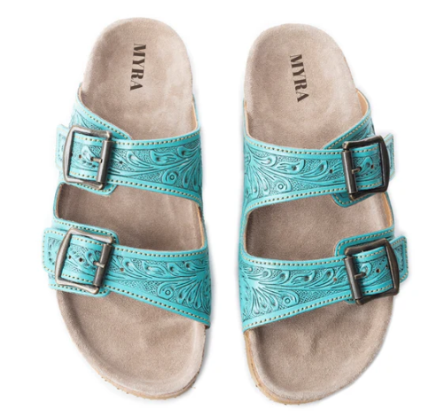 Wildflower Wanderer Sandals in turquoise with sunflower and vine motifs, adjustable brass buckles, and detailed tooling.