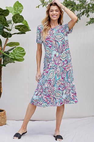 Bright Floral Print Dress with vibrant colors and playful design, perfect for any occasion.