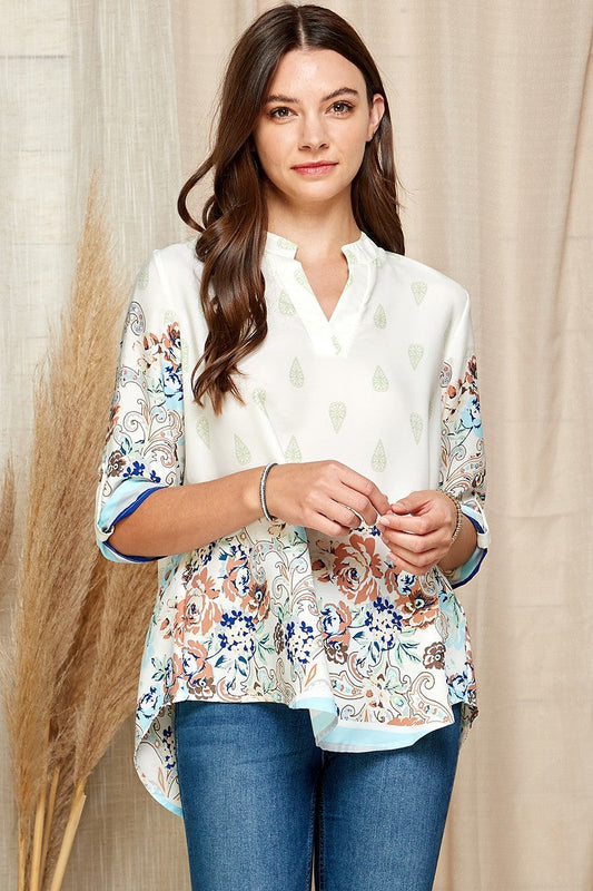 Multi Floral Gabby Collar Roll Up Sleeve Top with vibrant floral design.