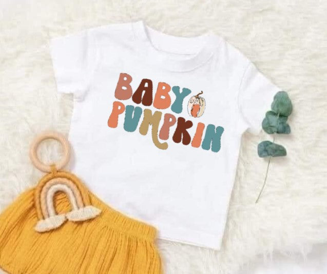 Baby Pumpkin shirt with colorful lettering on soft fabric, perfect for fall and Halloween.