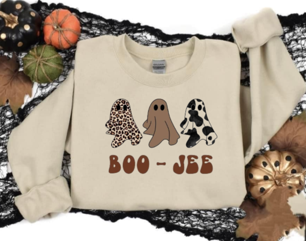 Boo-Jee Halloween shirt with playful ghost designs on a beige background.