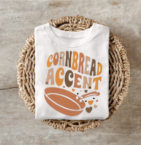 Cornbread Accent shirt with playful cornbread pattern.