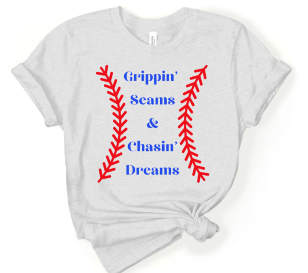 Softball and baseball themed Grippin Seams and Chasin Dreams T-shirt in gray with red and blue design.