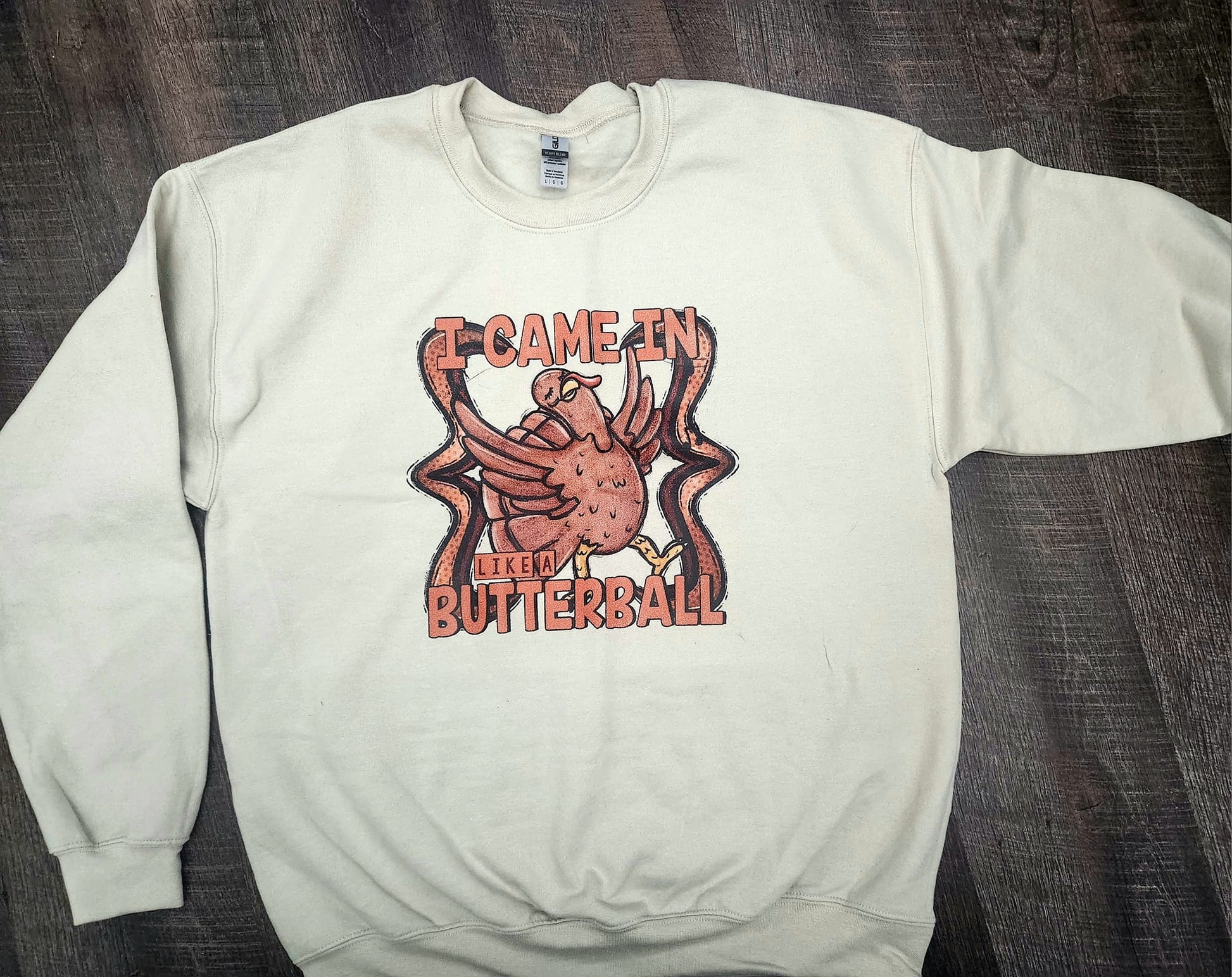 Gildan sweatshirt with "I Came In Like a Butterball" design, made from a 50/50 blend.