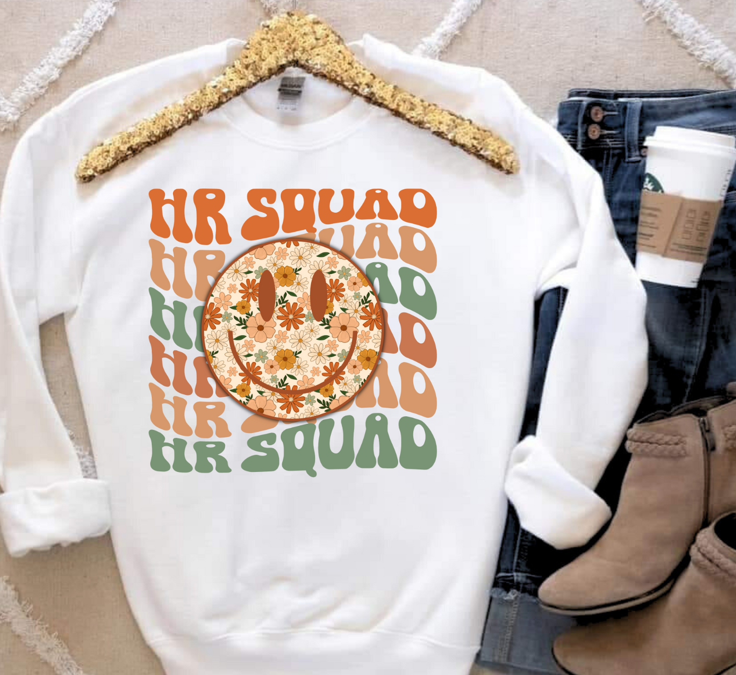 HR Squad shirt with colorful floral smiley design, ideal for work or casual wear.