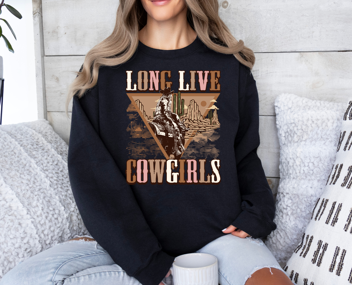 Long Live Cowgirls shirt showcasing cowgirl spirit and western style.