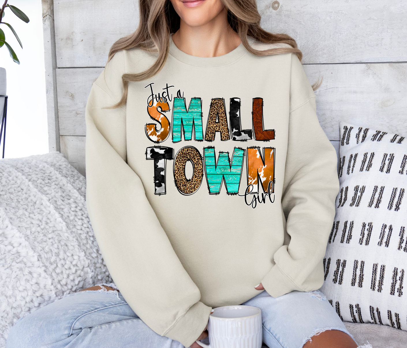 Small Town Girl sweatshirt with playful and colorful design.