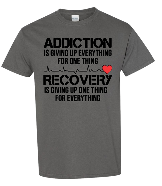 T-shirt with "Addiction is Giving Up Everything For One Thing" slogan, playful design.