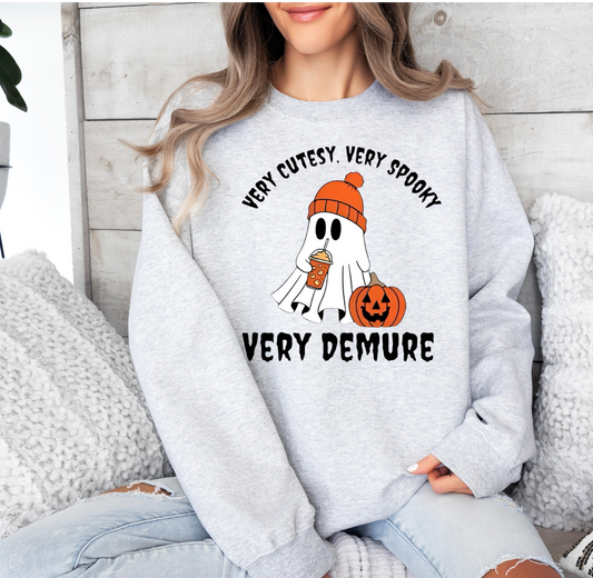 Very Cutesy spooky Halloween shirt featuring a cute ghost and pumpkin design.