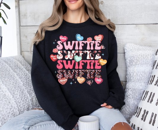 Sweatshirt with "Swiftie" graphic design, Gildan 50/50 blend or 100% cotton.