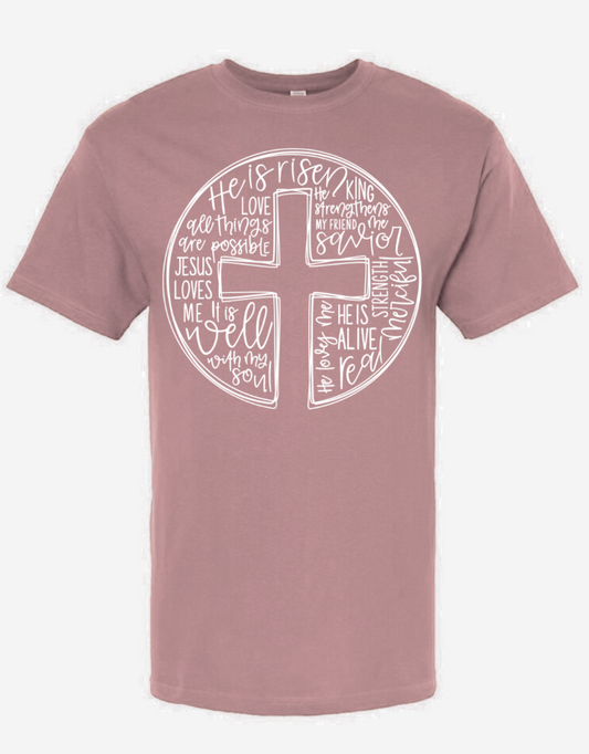 Gildan brand T-shirt with 'He Is Risen' design in white ink.