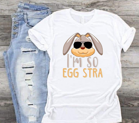 Easter "I'm So Eggstra" shirt with bunny design and text, perfect for holiday style.