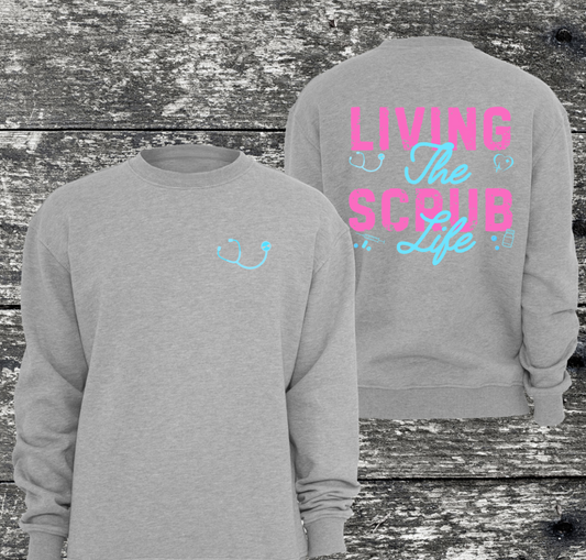 Living the Scrub Life sweatshirt with stethoscope design, Gildan brand, available in 50/50 blend or 100% cotton.