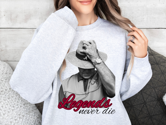 Gildan Legends Never Die sweatshirt featuring a black and white graphic with red text.