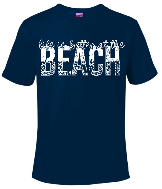 Life Is Better At The Beach navy blue T-shirt, Gildan brand, 100% cotton or 50/50 blend.