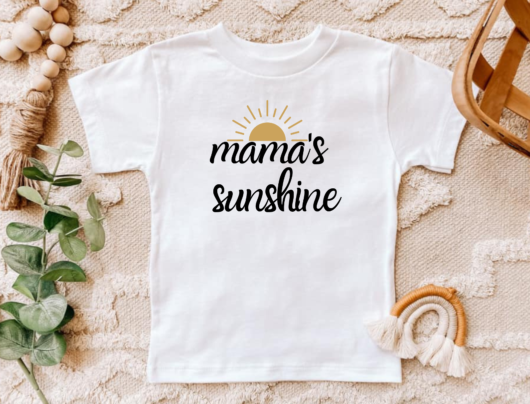 Infant and toddler shirt with "Mama's Sunshine" design on a white background.