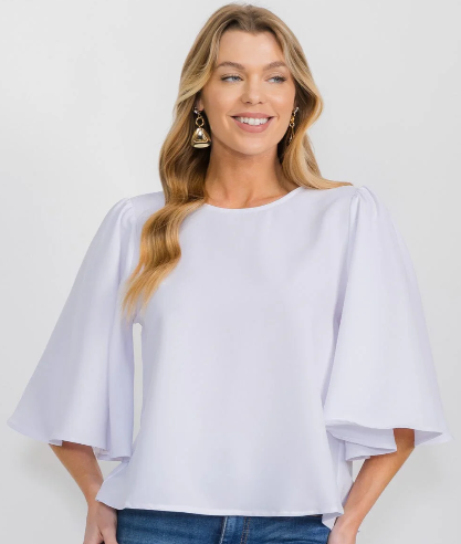 SHORT BELL SLEEVED solid blouse with bell sleeves.