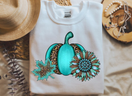 Turquoise Pumpkins shirt with playful autumn design featuring turquoise pumpkins, floral accents, and leopard print details.