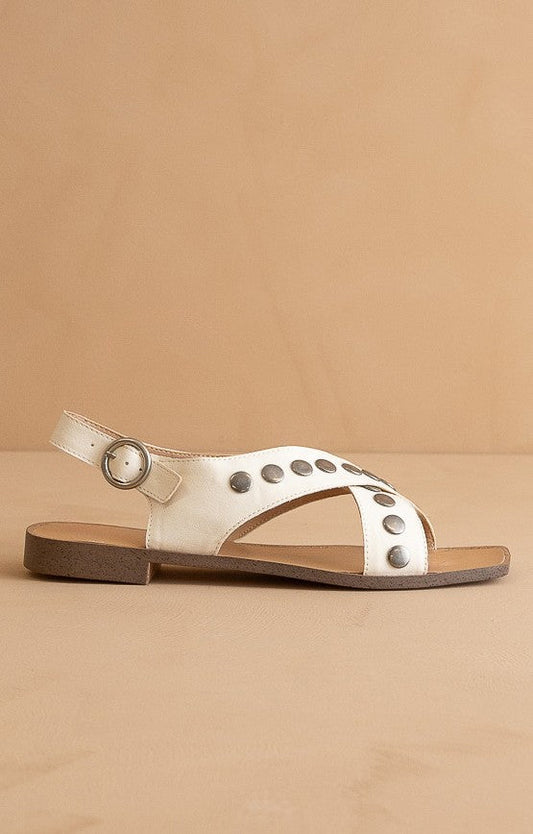 The Kylie studded cross band sandal with ankle strap and platform sole.
