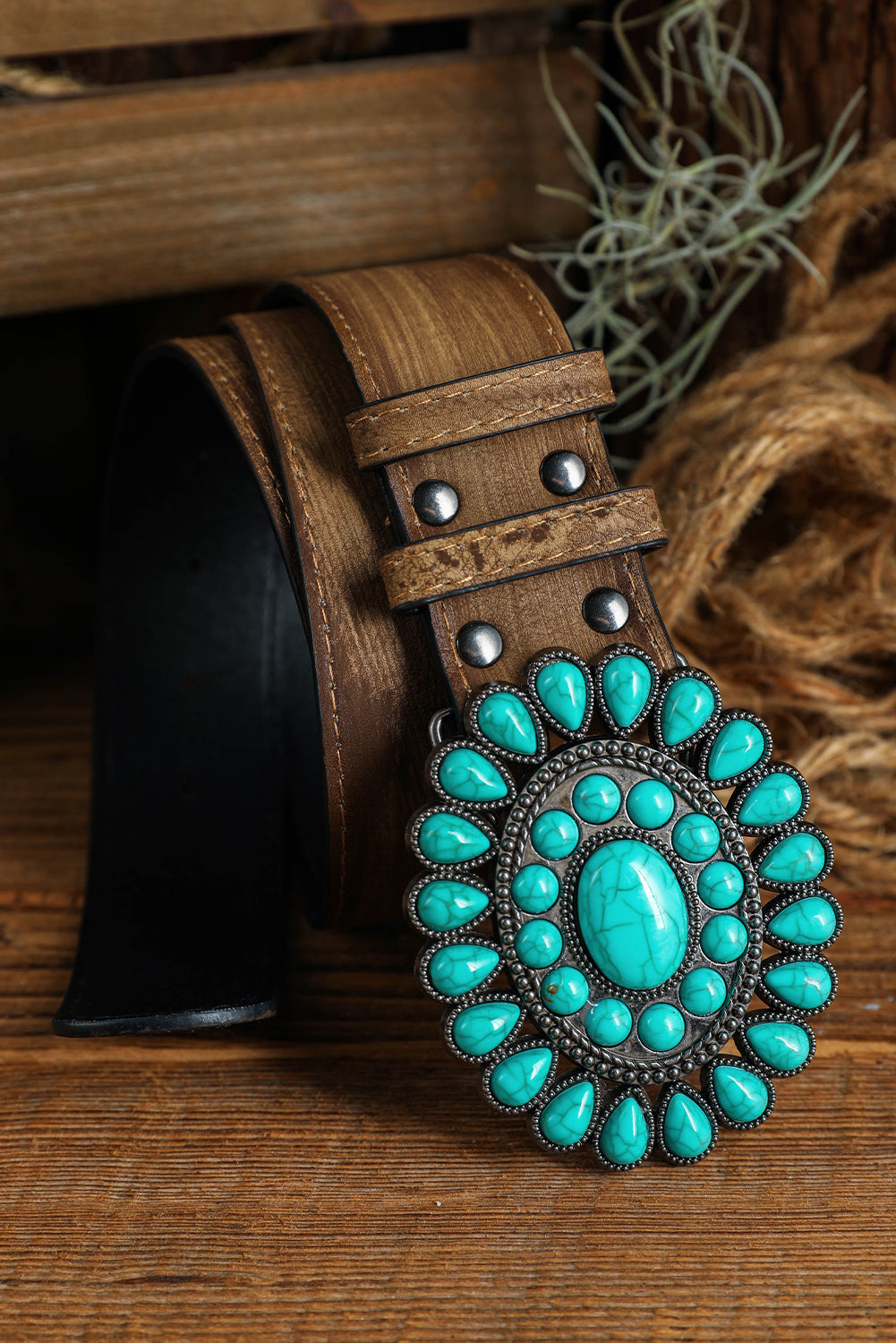 Retro Wide Belt with Turquoise Buckle on Wooden Background