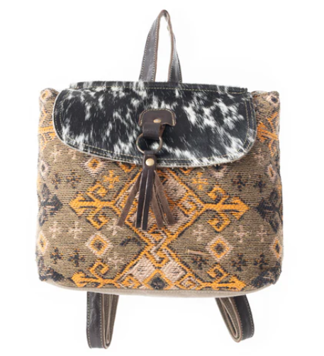 MYRA-Hyppity Backpack with dalmatian-esque spots, canvas and hairon material.