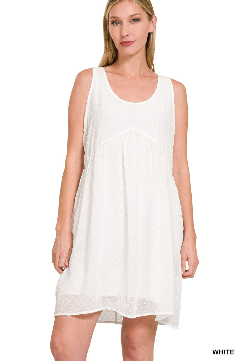 White Swiss Dot Babydoll Scoop Neck Dress with playful and sophisticated design.