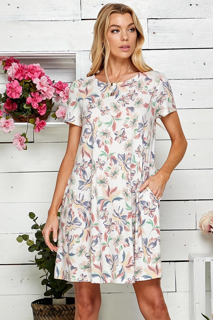 Floral T-shirt dress with pockets, soft material, stylish and comfortable.