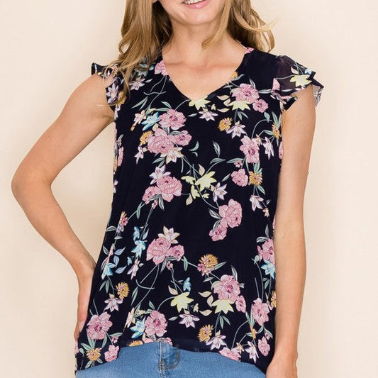 Navy floral print sleeveless blouse with ruffle details and V-neckline.