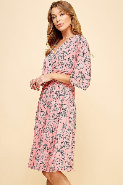 Floral dolman sleeves faux wrap short dress in pink designed for summer.