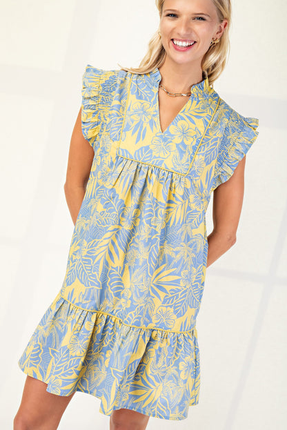 Printed mini dress with blue ruffle sleeves and playful pattern.