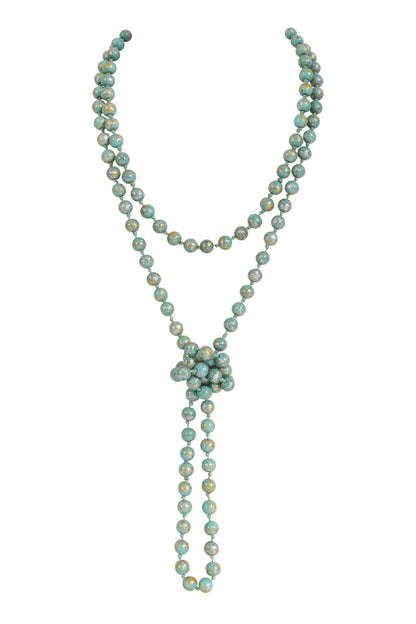 Versatile long natural stone beaded necklace, elegant earthy bead design, adjustable styling.