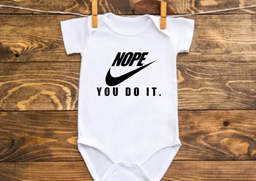 Infant and toddler shirt with playful slogan design.