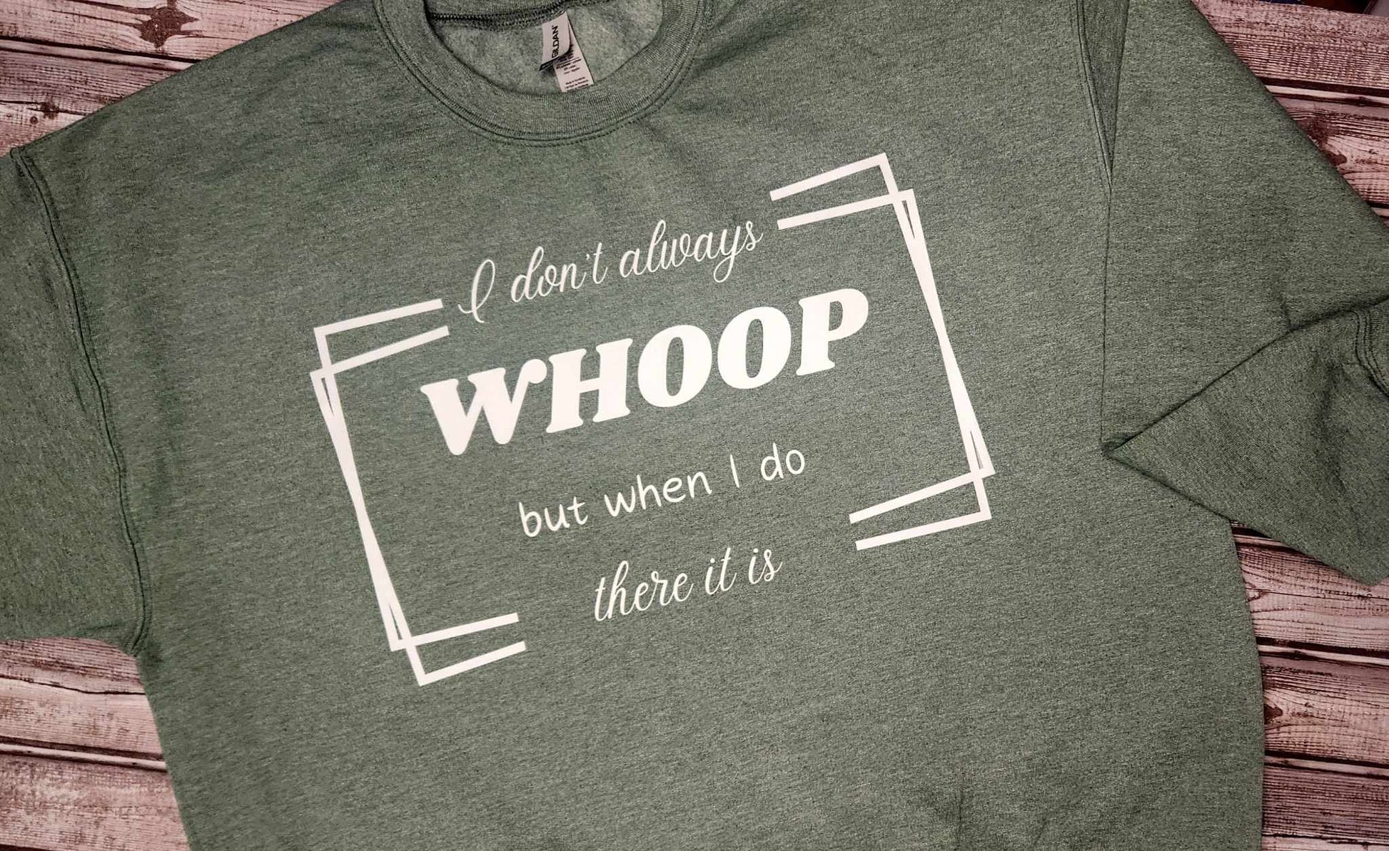Green sweatshirt with the humorous phrase "I Don't Always Whoop But When I Do There It Is" in white text.