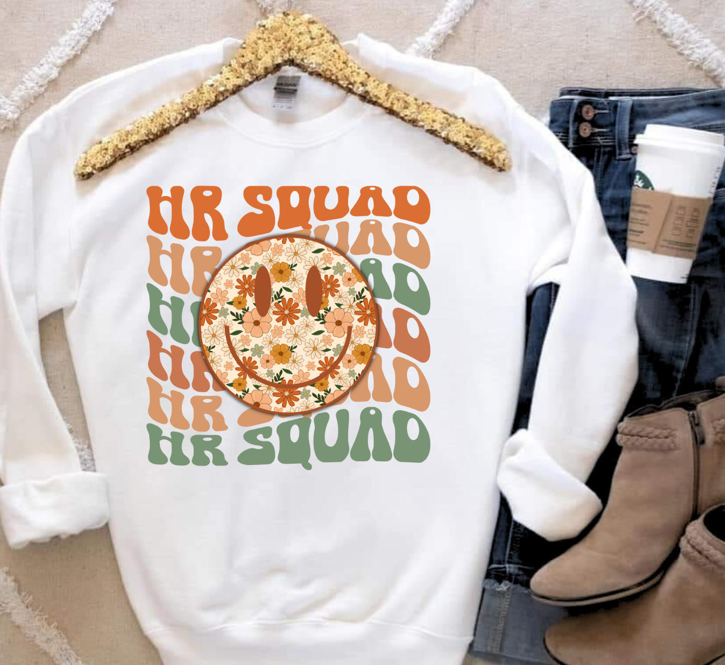 HR Squad shirt with colorful floral smiley design, ideal for work or casual wear.