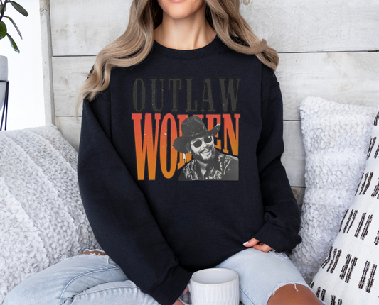 Outlaw Women shirt with retro design, featuring text and image on a black sweatshirt.