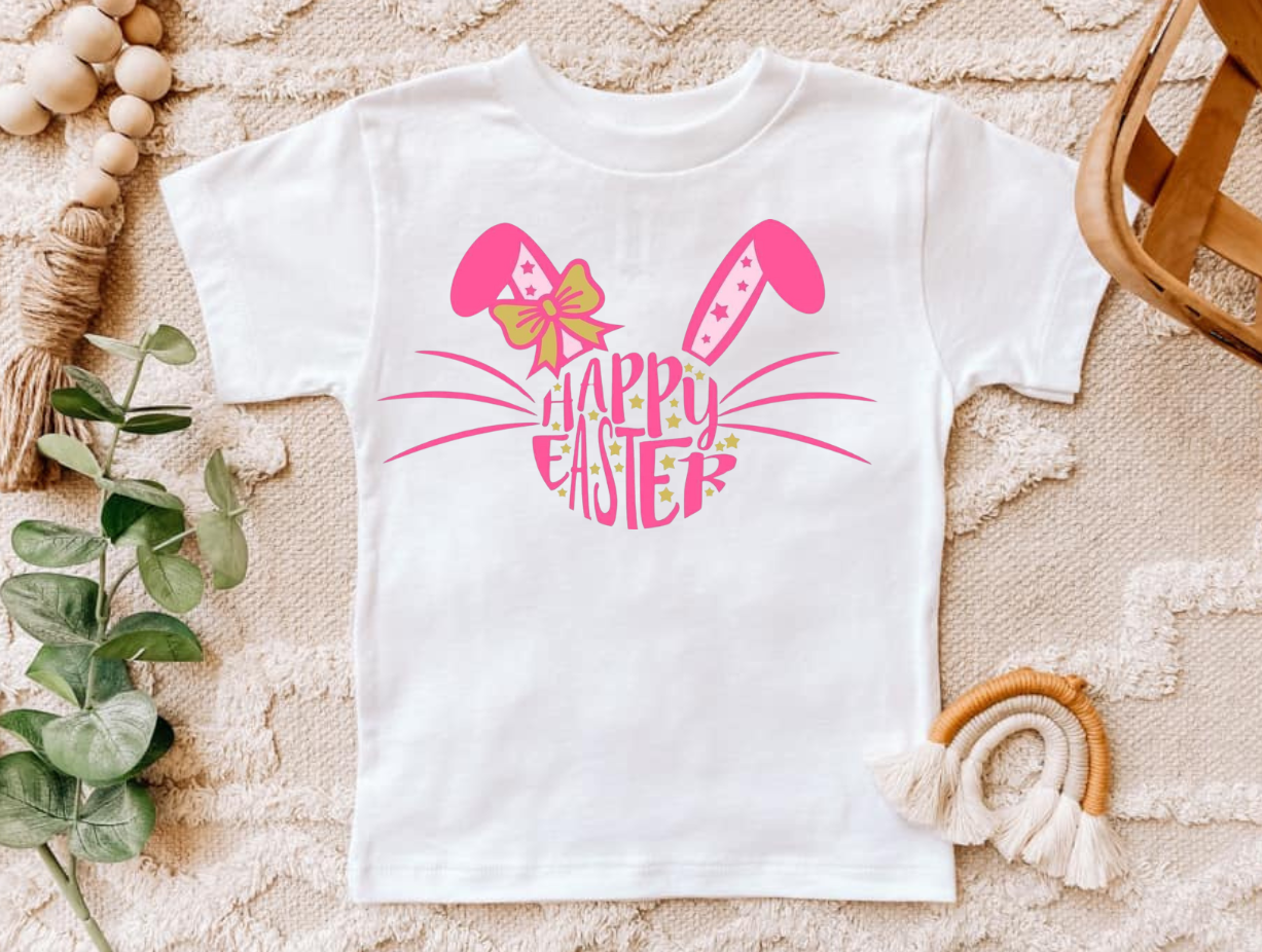 Happy Easter pink shirt with bunny ears design on a white background.