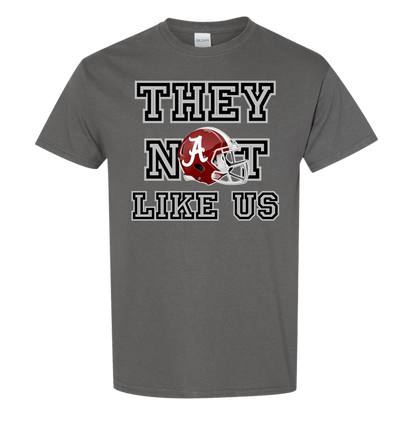 Alabama- They Not Like Us T-Shirt featuring football helmet graphic and bold text.