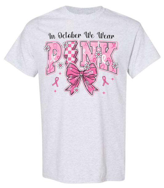 Breast Cancer Awareness Month "In October We Wear Pink" shirt with pink ribbon design.
