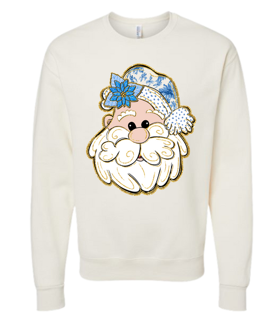 Santa- Blue shirt with festive design and quirky blue Santa Claus graphic.
