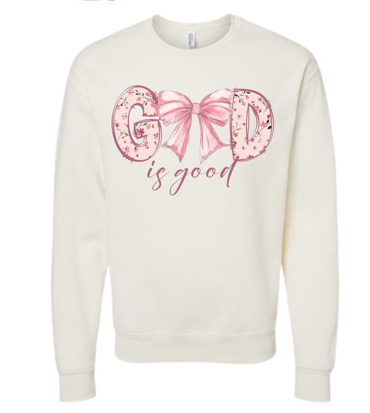 God Is Good shirt with pink floral design and bow.
