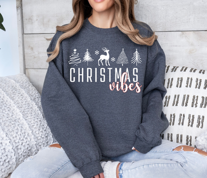 Christmas Vibes shirt with festive trees and deer design.