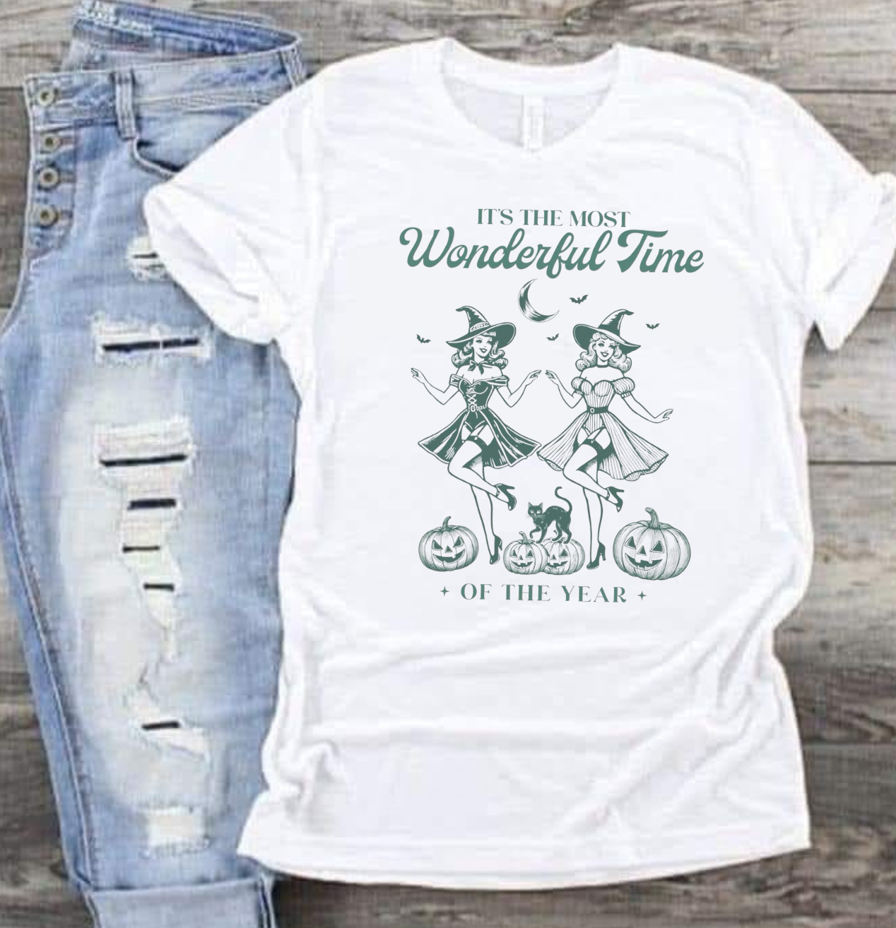 White "It's The Most Wonderful Time Of The Year" Halloween shirt with playful witch design.