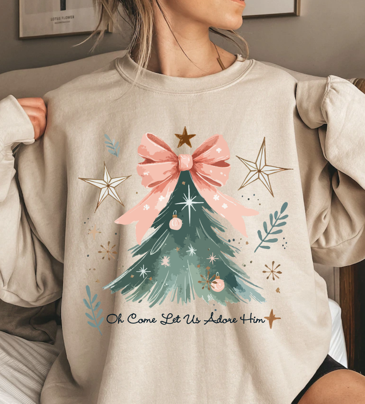 Christmas Tree shirt with pink bow and festive design, featuring the phrase "Oh Come Let Us Adore Him."