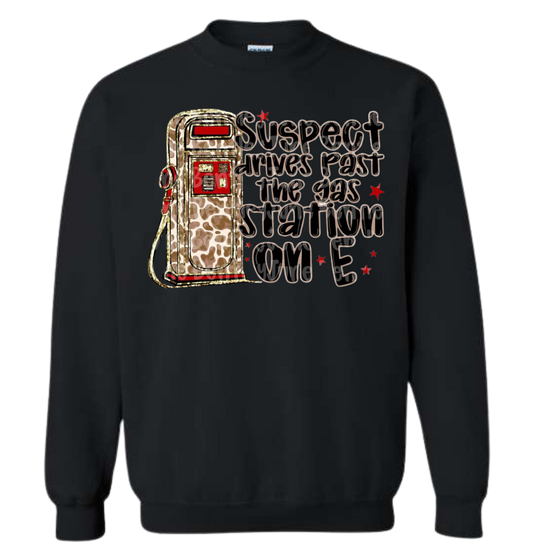 Suspect Gas Station shirt with humorous gas pump graphic and text.