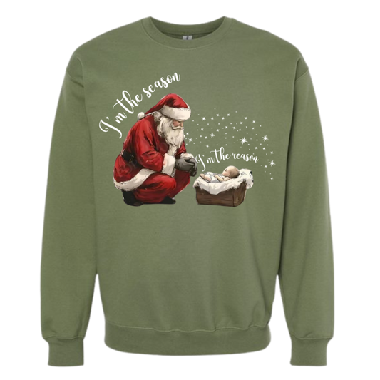 I'm The Season- I'm the Reason Christmas shirt featuring Santa and baby Jesus.