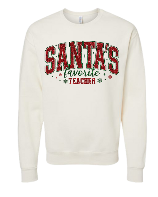 Santa's Favorite Teacher festive holiday shirt with red and green lettering.