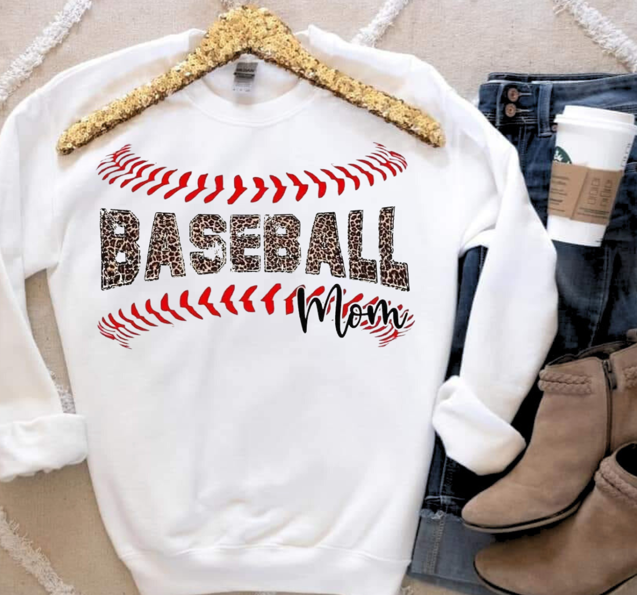 Baseball Mom vintage print sweatshirt with leopard design on hanger.