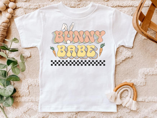 Bunny Babe shirt with cute bunny graphic and carrots on white fabric.