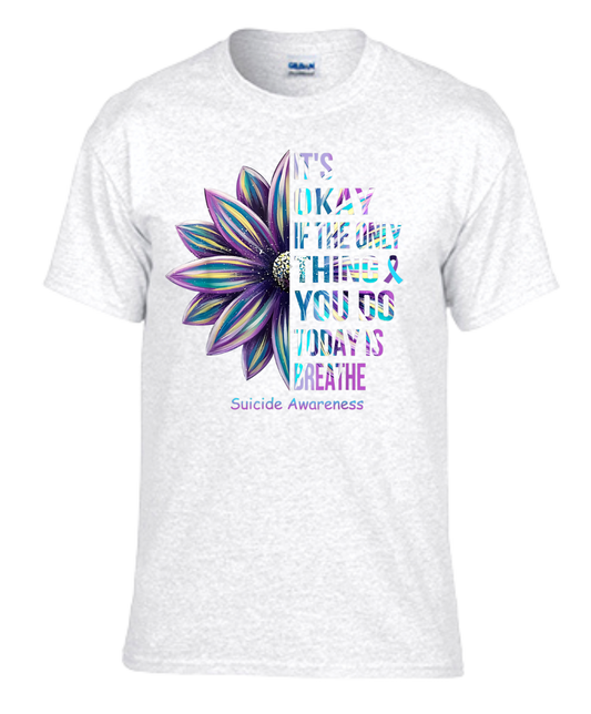 T-shirt with "It's Okay If The Only Thing You Did Today Was Breathe" design featuring a colorful flower for self-care and self-love.